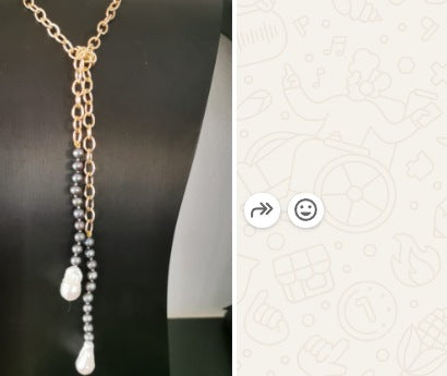 Gold lariat necklace with charcoal-grey pearls and white baroque pearl drops
